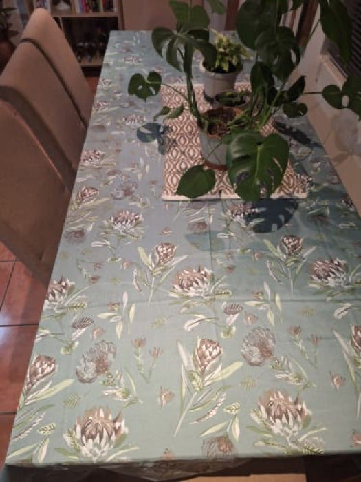 Pastel Green Protea on a customer's table