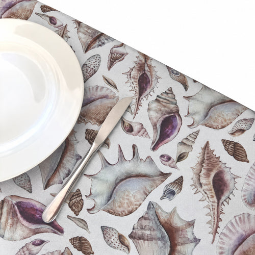 Coastal Escape tablecloth by My Table, close-up with a place setting