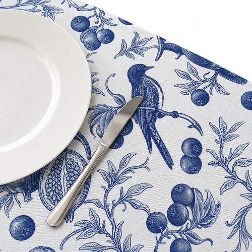 Delft Blue tablecloth close-up with plate and knife