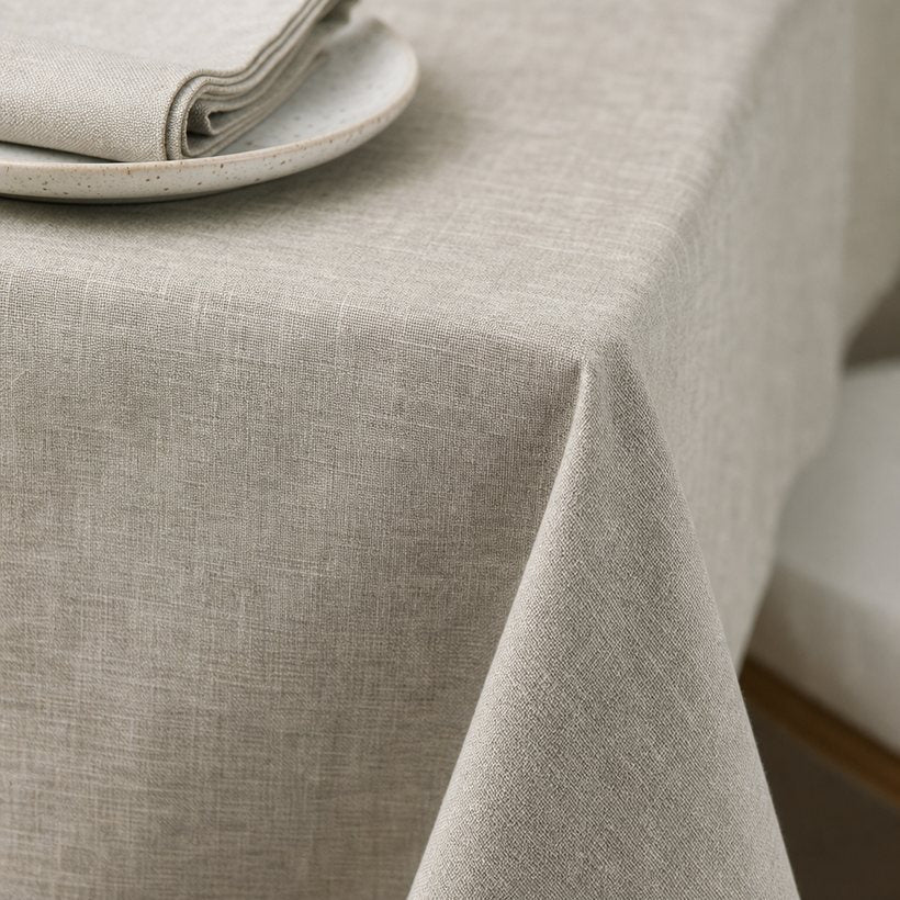 Neutral linen-look tablecloth on a styled table